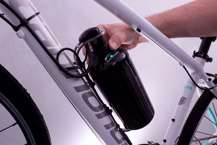 tilt the bottle in to the cage, then bring down the plug and clamp